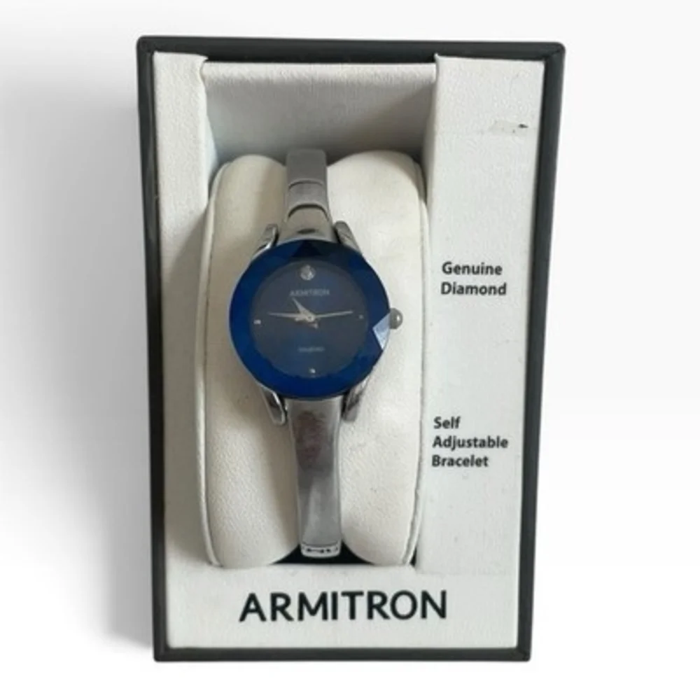 Armitron Womens Watch Genuine Diamond Blue Dial Silver Bangle Bracelet VG